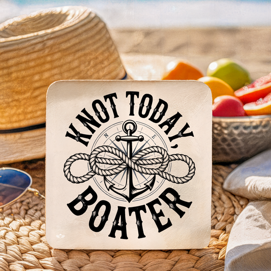 Card with "Knot Today, Boater" design on a woven surface with fruit and sunglasses.