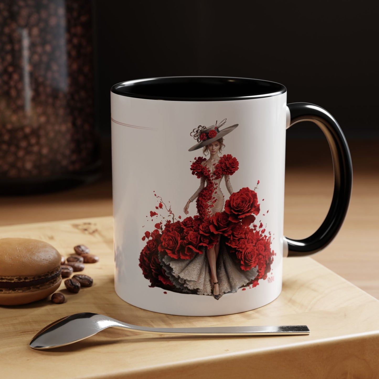Mug with a design of a woman in a red dress on a wooden surface with coffee beans and a spoon.