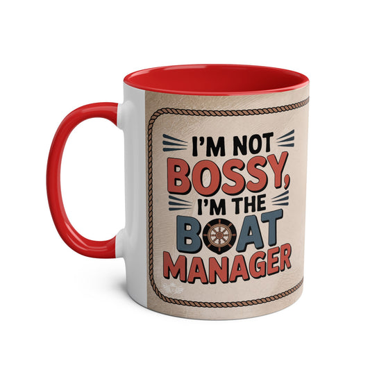 Mug with text "I'm not bossy, I'm the boat manager" on a beige background