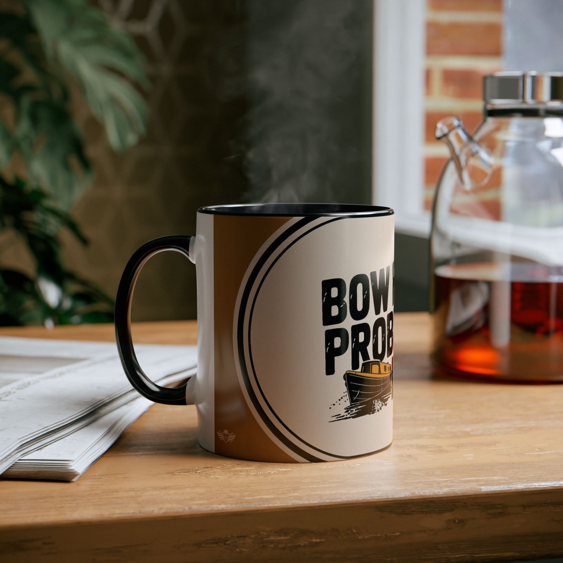 Mug with narrowboat design on a wooden surface with a blurred background