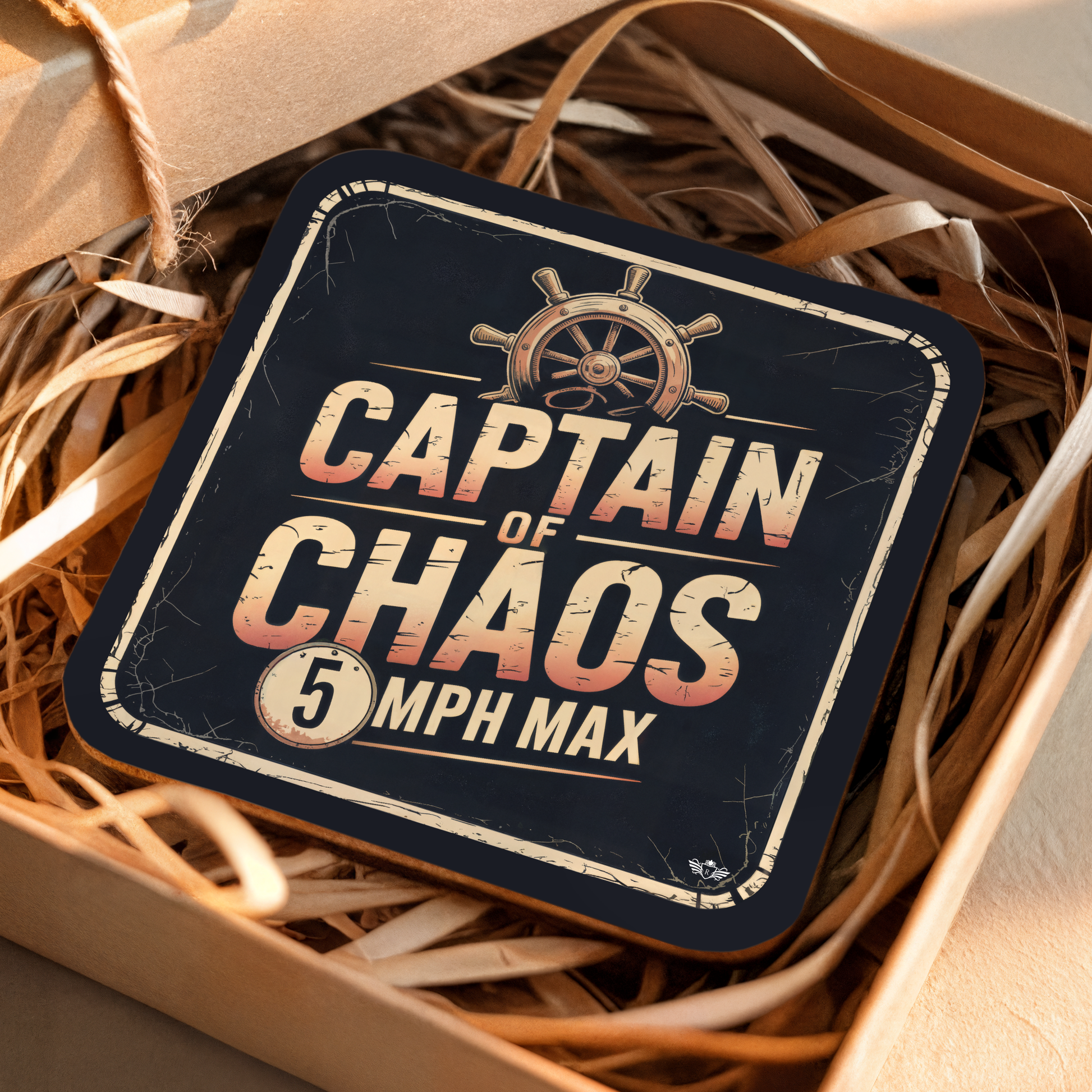 Coaster with "Captain of Chaos" design on a woven surface