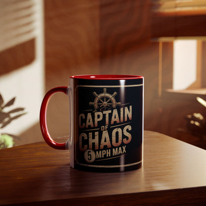 Mug with "Captain of Chaos 5 MPH Max" text on a wooden surface
