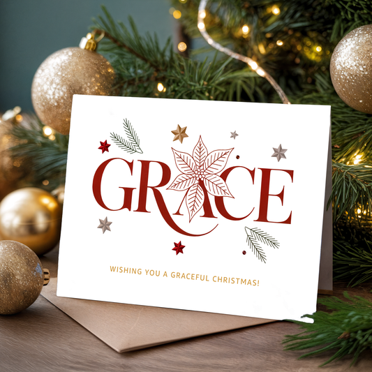 Christmas card with "GRACE| and festive decorations in front of a Christmas tree.