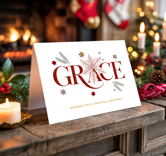 Christmas card with "GRACE" on a festive background with candles and decorations.