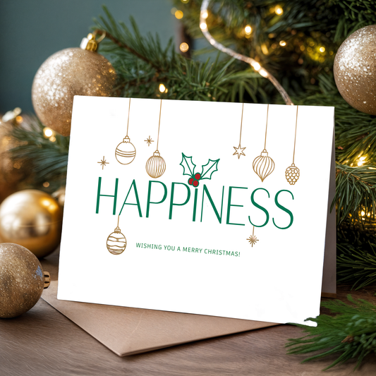 Christmas card with "Happiness" and festive decorations in front of a Christmas tree.