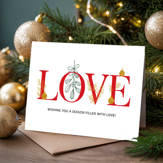 Christmas greeting card with the word "Love" and festive elements