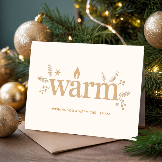 Christmas card with the word "Warm" and "Wishing you a warm Christmas!" text, surrounded by festive decorations.