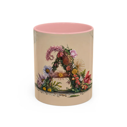 Ceramic mug with floral design and pink interior on a beige background