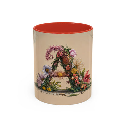 Decorative mug with floral design and red interior on beige background