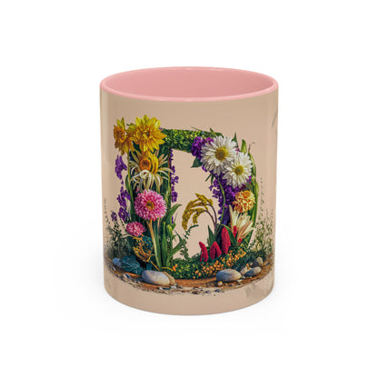Mug with floral design and pink interior on a white background