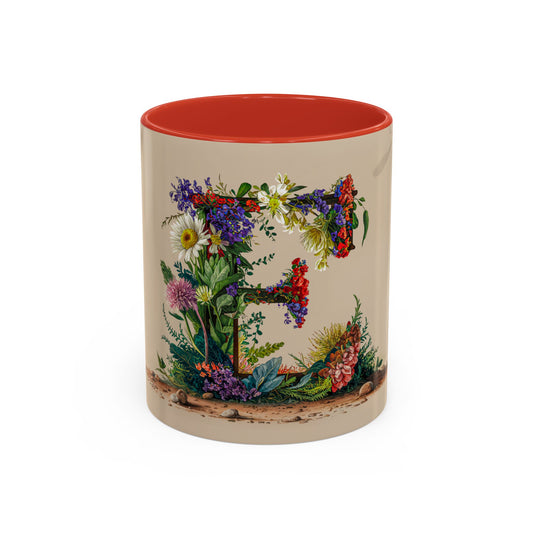 Mug with floral design and red interior on a white background