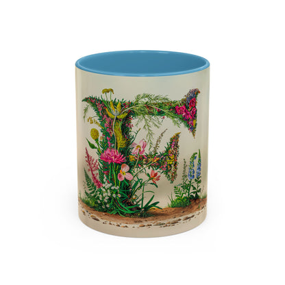 Mug with floral design and letter 'F' on a white background