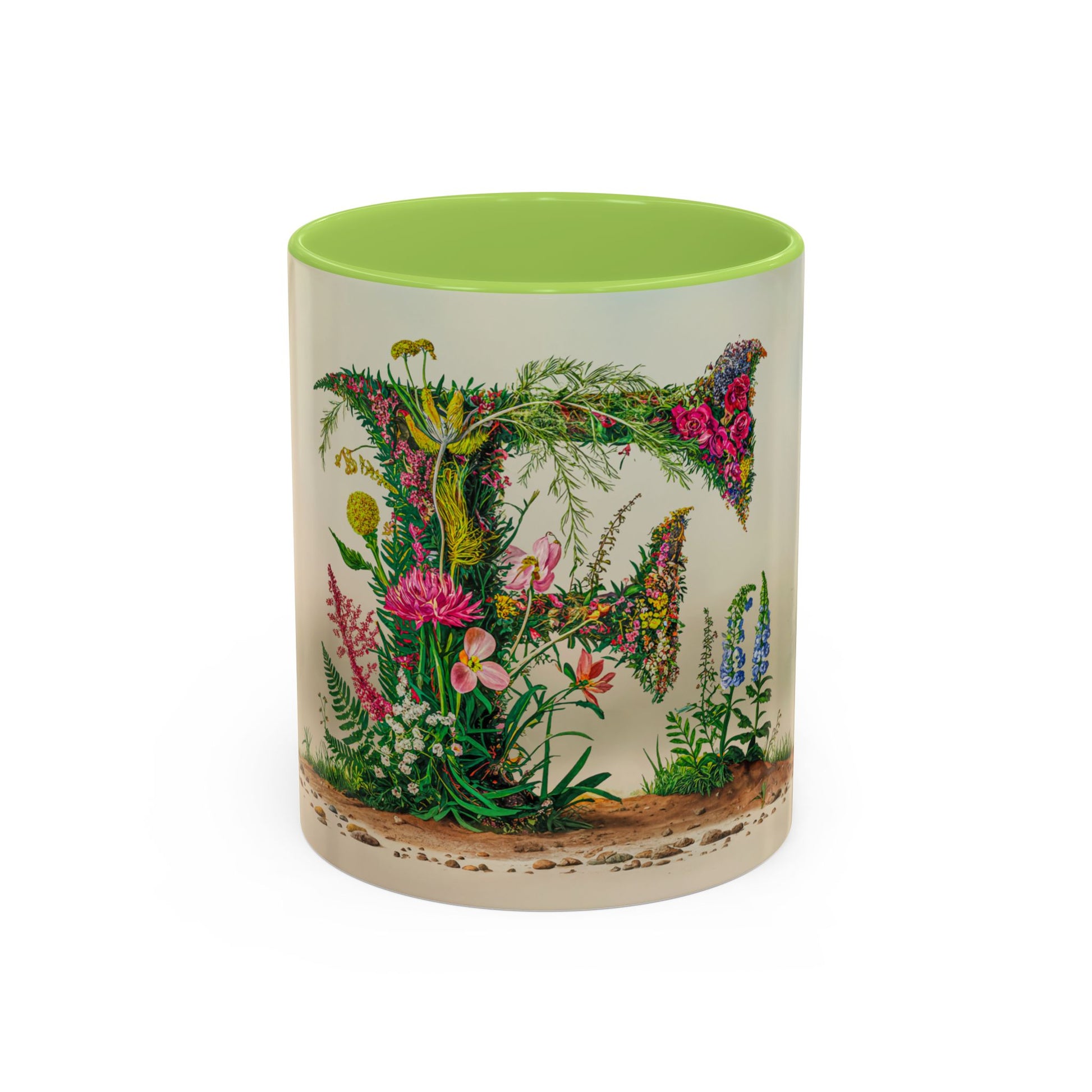 Mug with floral design and green interior on a white background