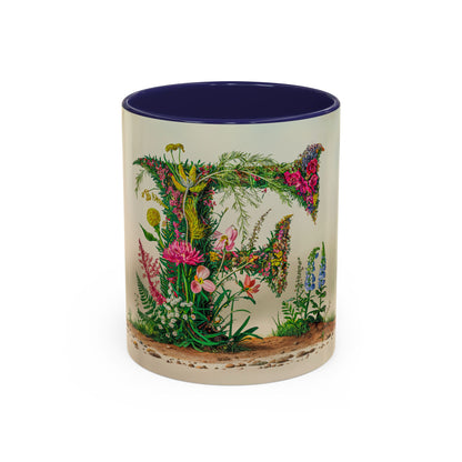 Mug with floral design and letter 'F' on a white background