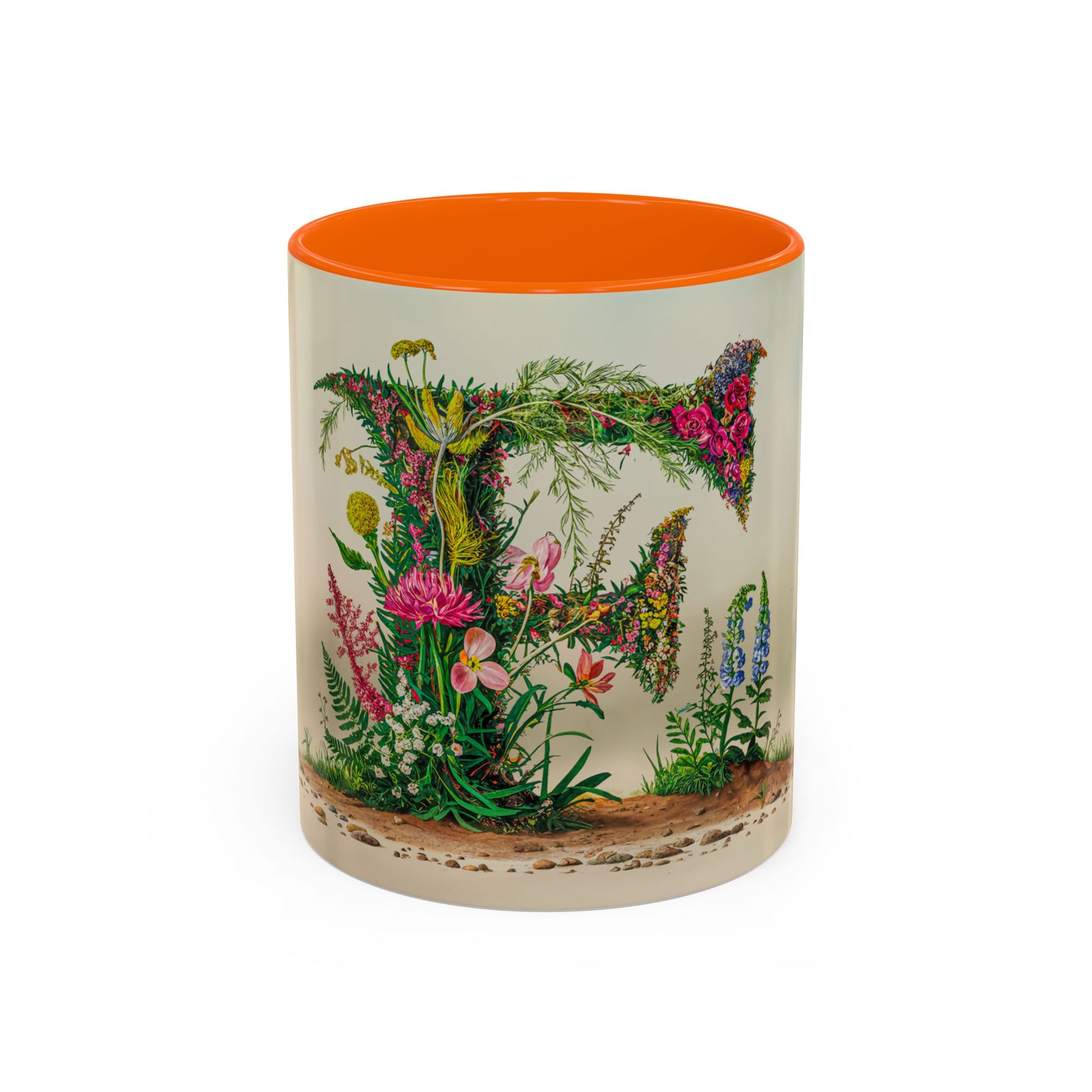 Mug with floral design and orange interior on a white background