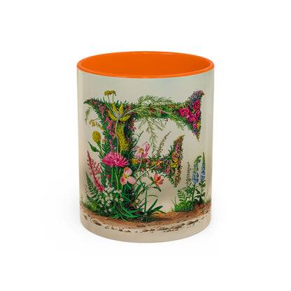 Mug with floral design and orange interior on a white background
