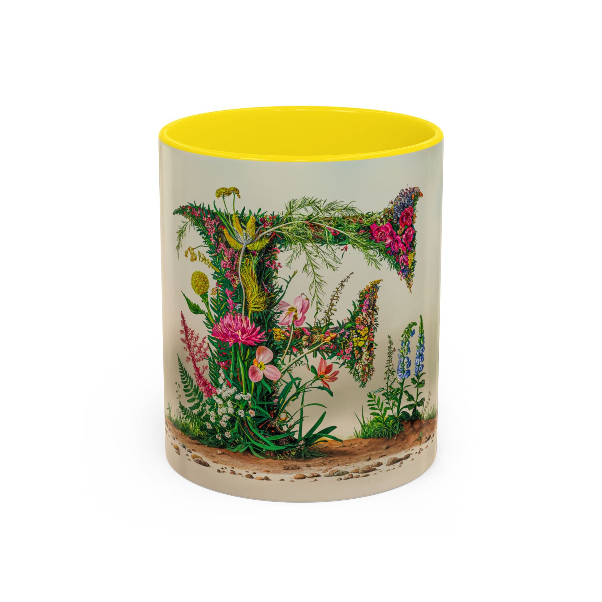 Mug with floral design and yellow interior on a white background