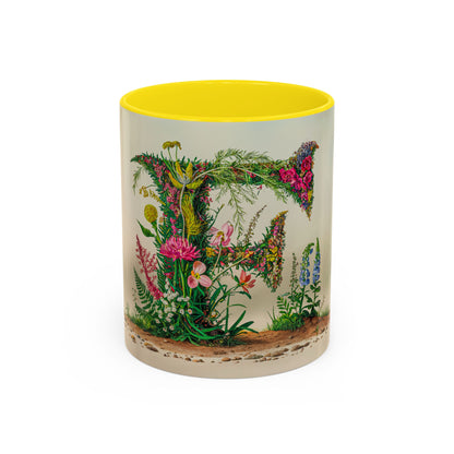 Mug with floral design and yellow interior on a white background