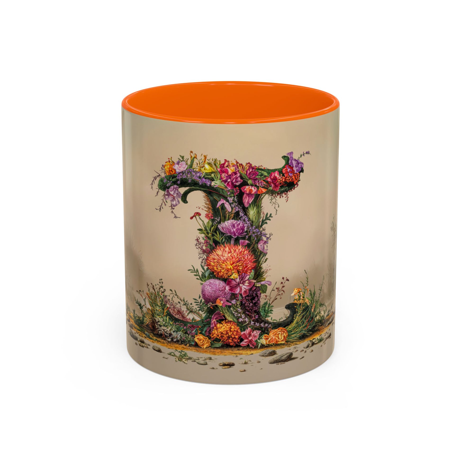 Mug with floral design and orange interior on beige background