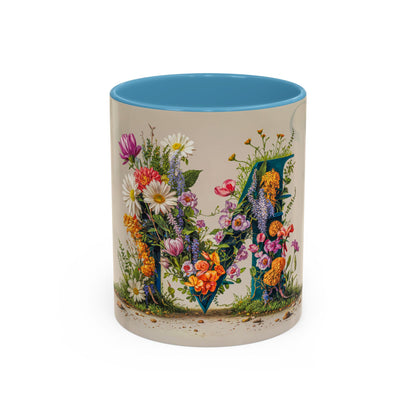 Mug with floral design and letter M on a white background