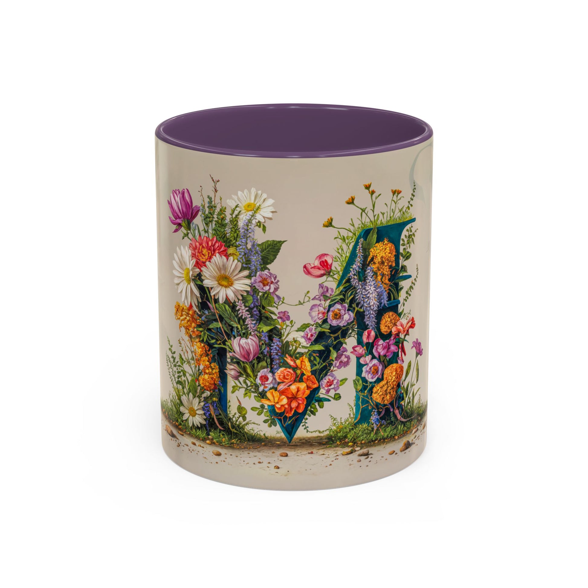 Mug with floral design and letter M on a white background