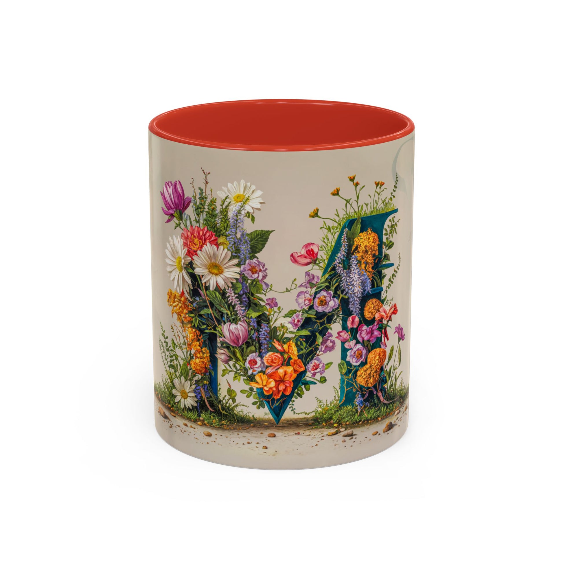 Mug with floral design and red interior on a white background