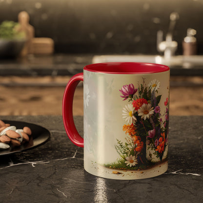Mug with floral design and red interior on a kitchen counter