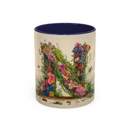 Mug with floral letter N design on a white background