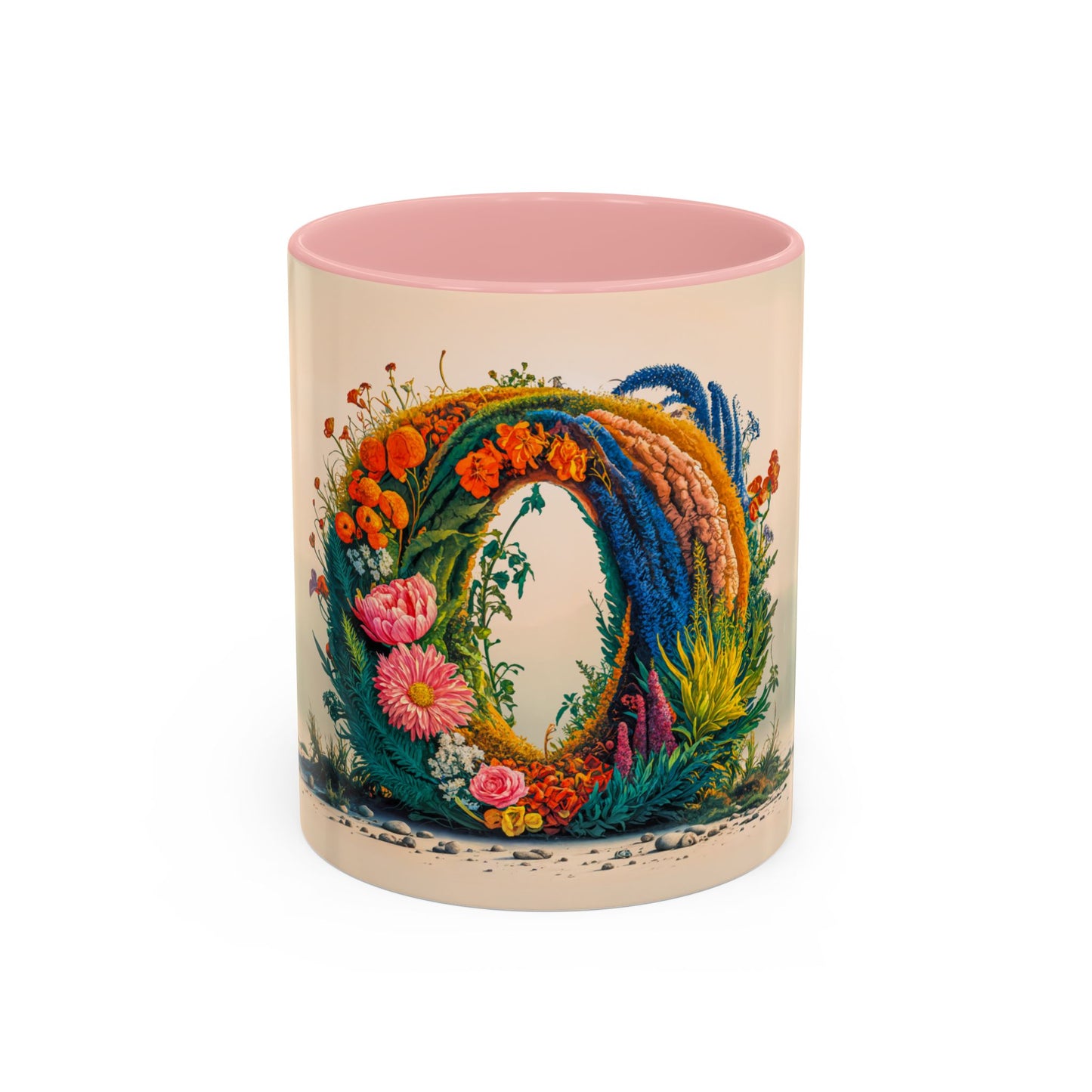 Decorative mug with floral design and pink interior on a white background