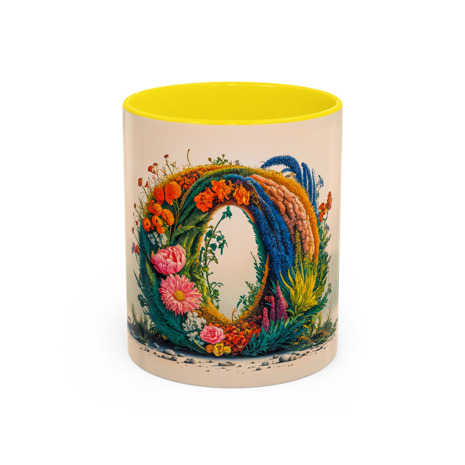 Decorative mug with floral design and yellow interior on a white background