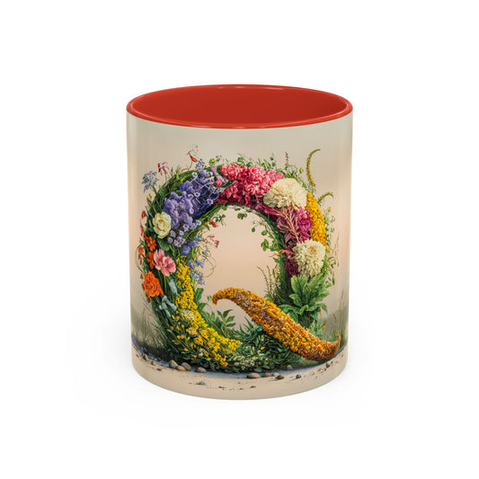 Mug with floral design and red interior on a white background