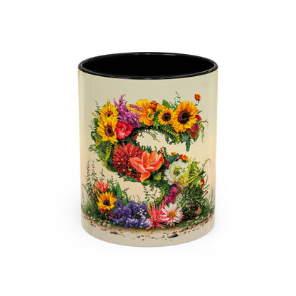 Decorative mug with floral design on a white background