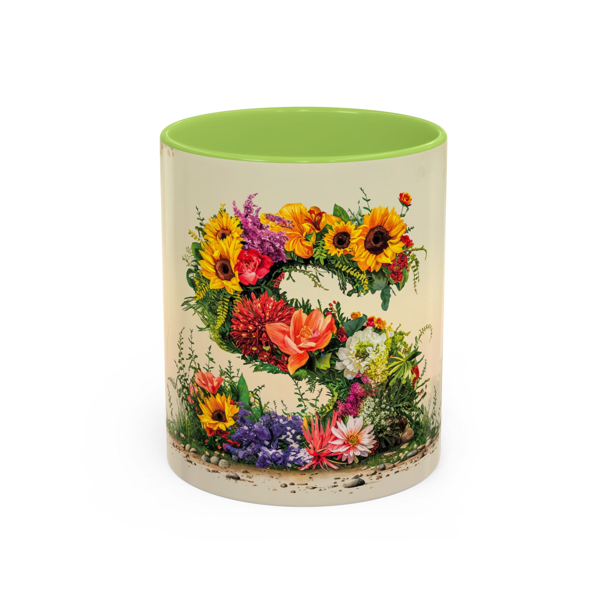 Mug with floral design and green lid on a white background