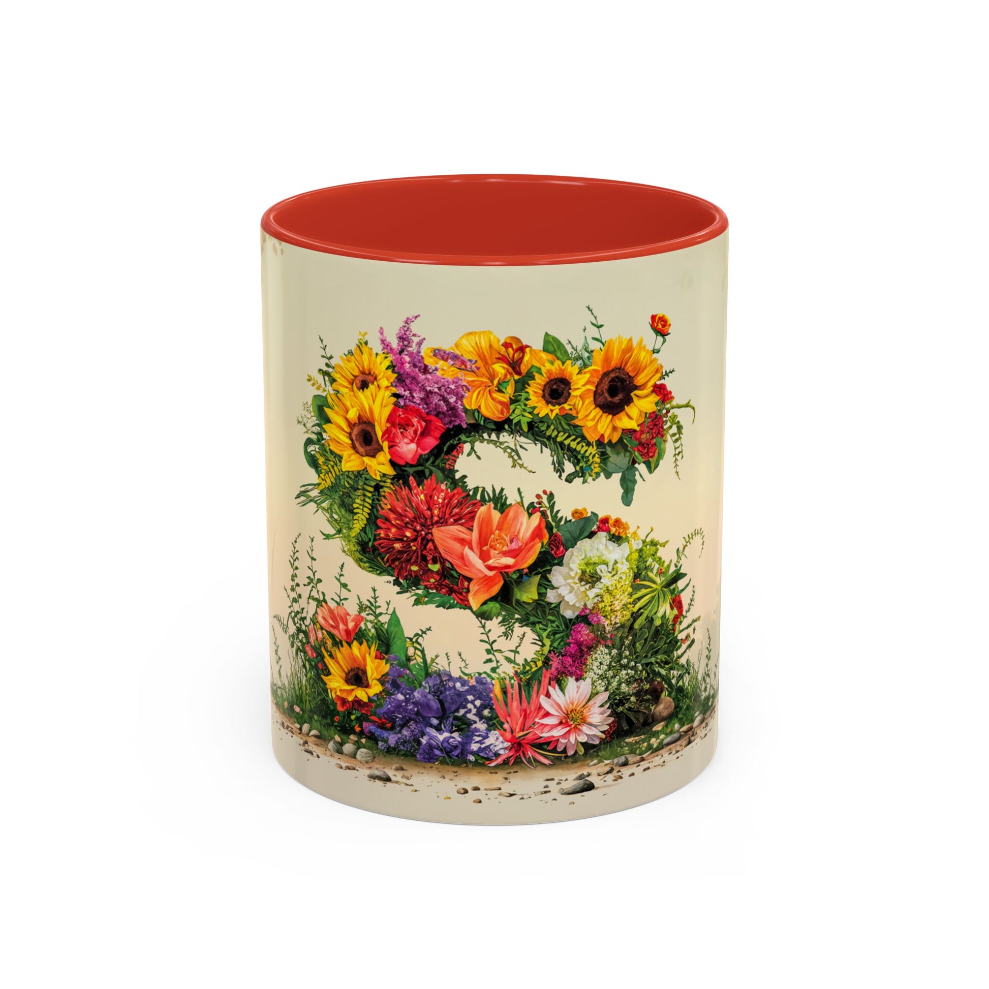 Mug with floral design and red interior on a white background