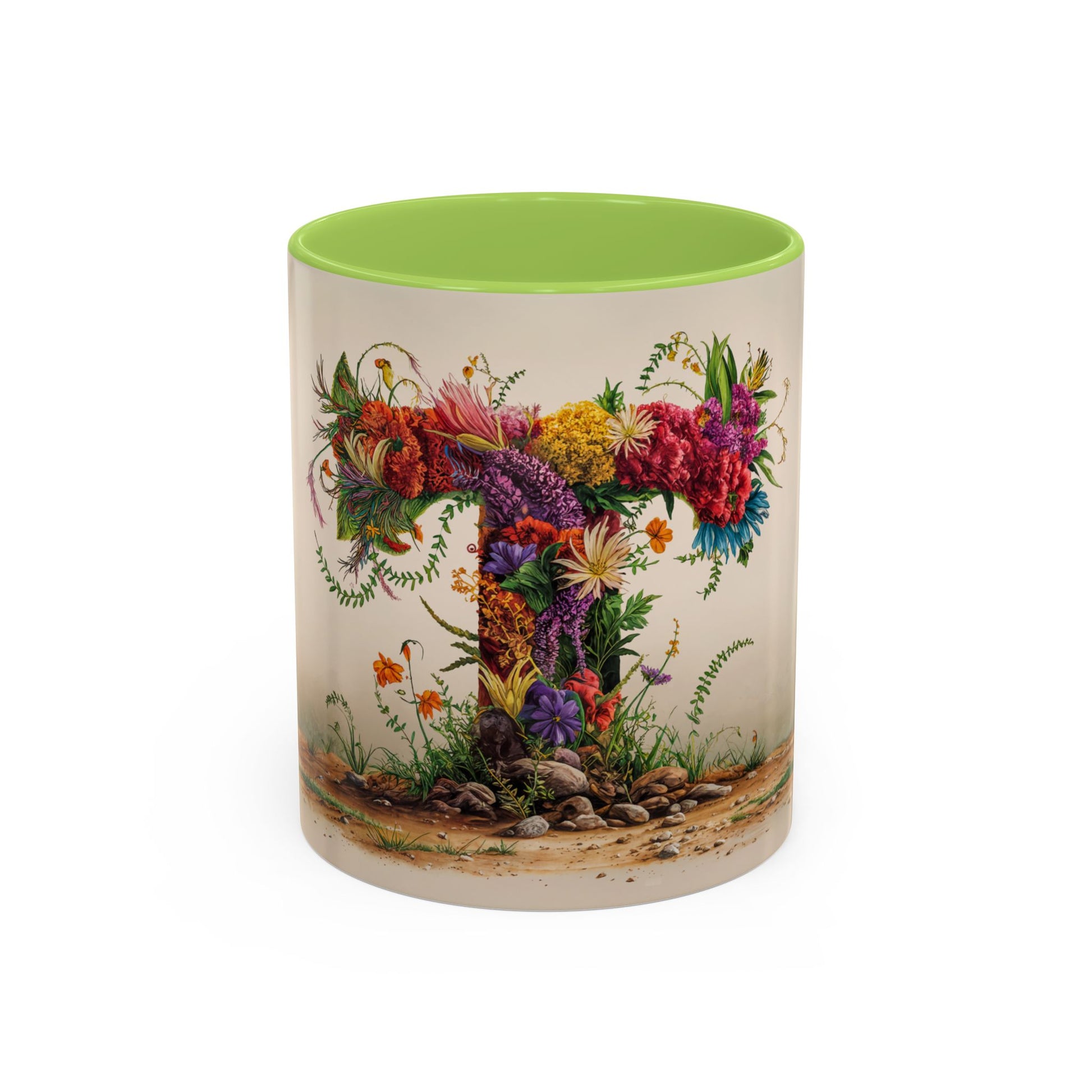 Mug with floral design and green interior on a white background