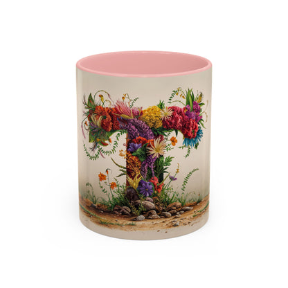 Mug with floral design and pink interior on a white background