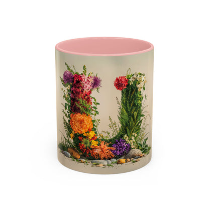 Mug with floral design and pink interior on a white background