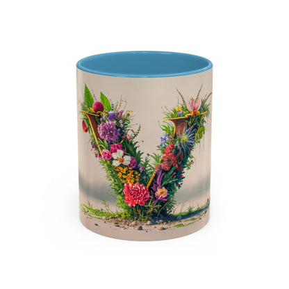Mug with floral design and blue interior on a white background