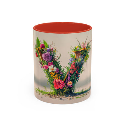 Mug with floral design and red interior on a white background