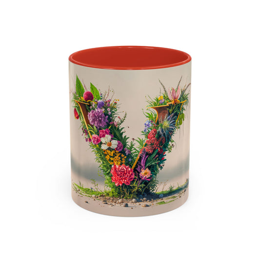 Mug with floral design and red interior on a white background