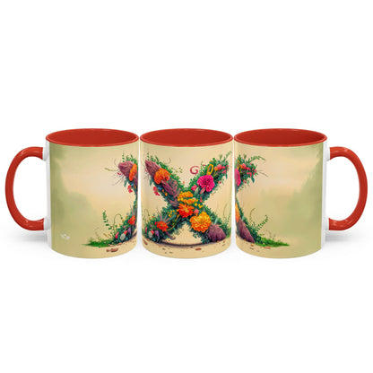 Three mugs with floral design and red handles on a white background
