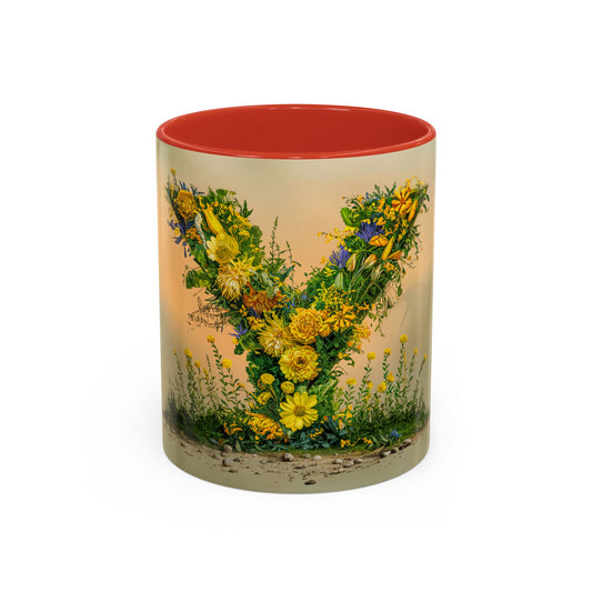 Mug with floral design and red interior on a white background