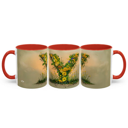 Three mugs with floral design and red handles on a white background
