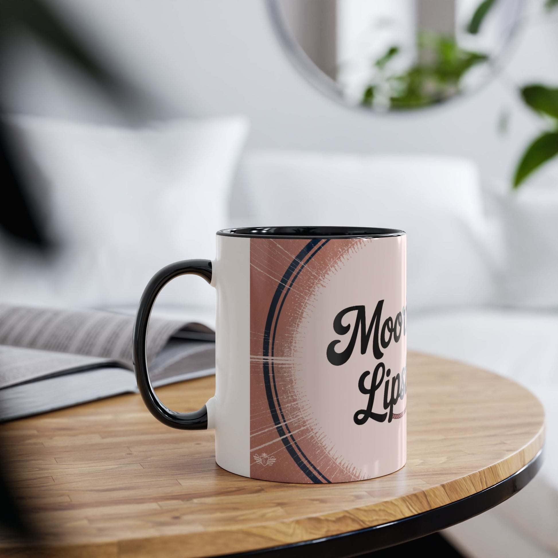 Mug with black handle and interior on a wooden table